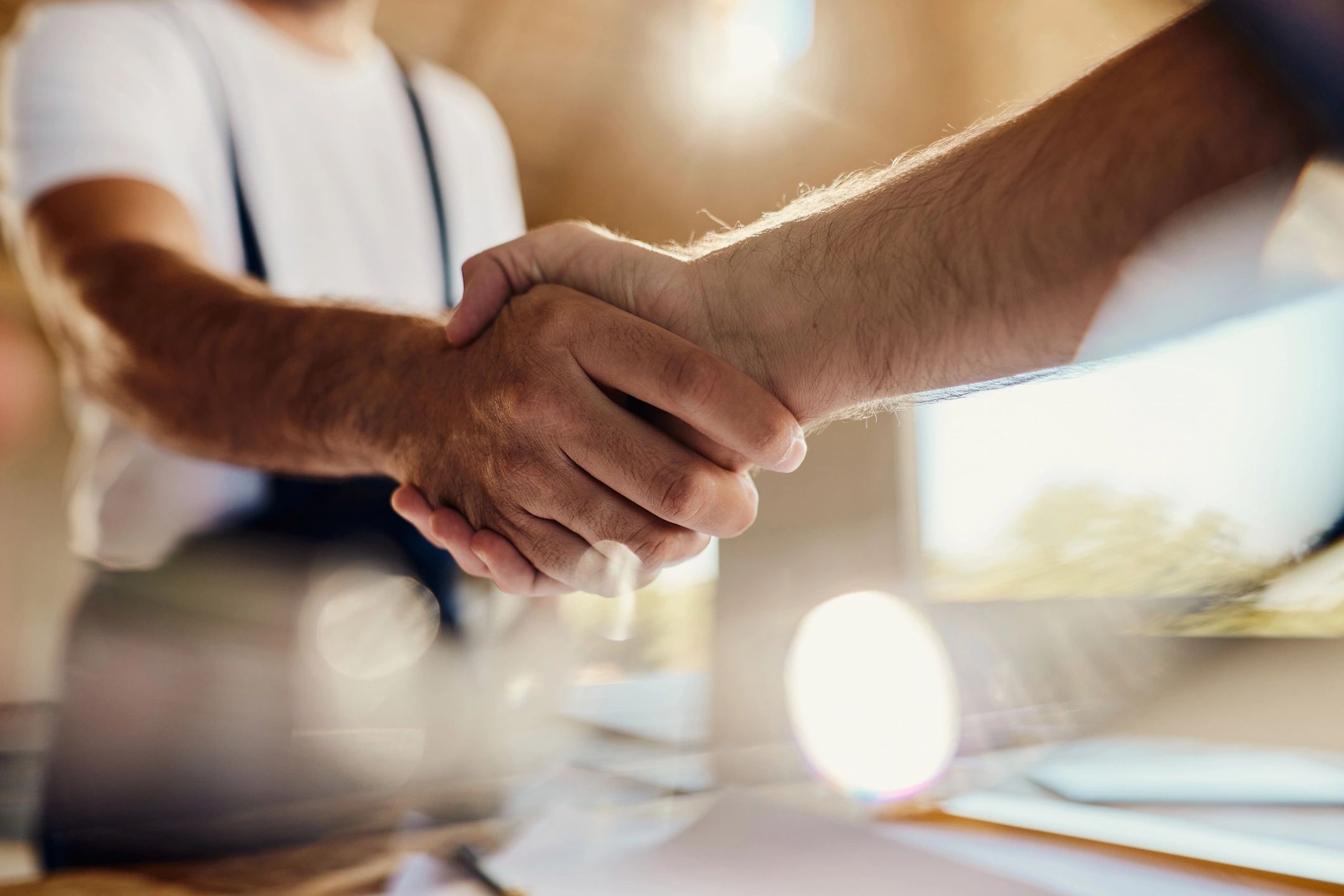 Handshake representing partnership and business agreement