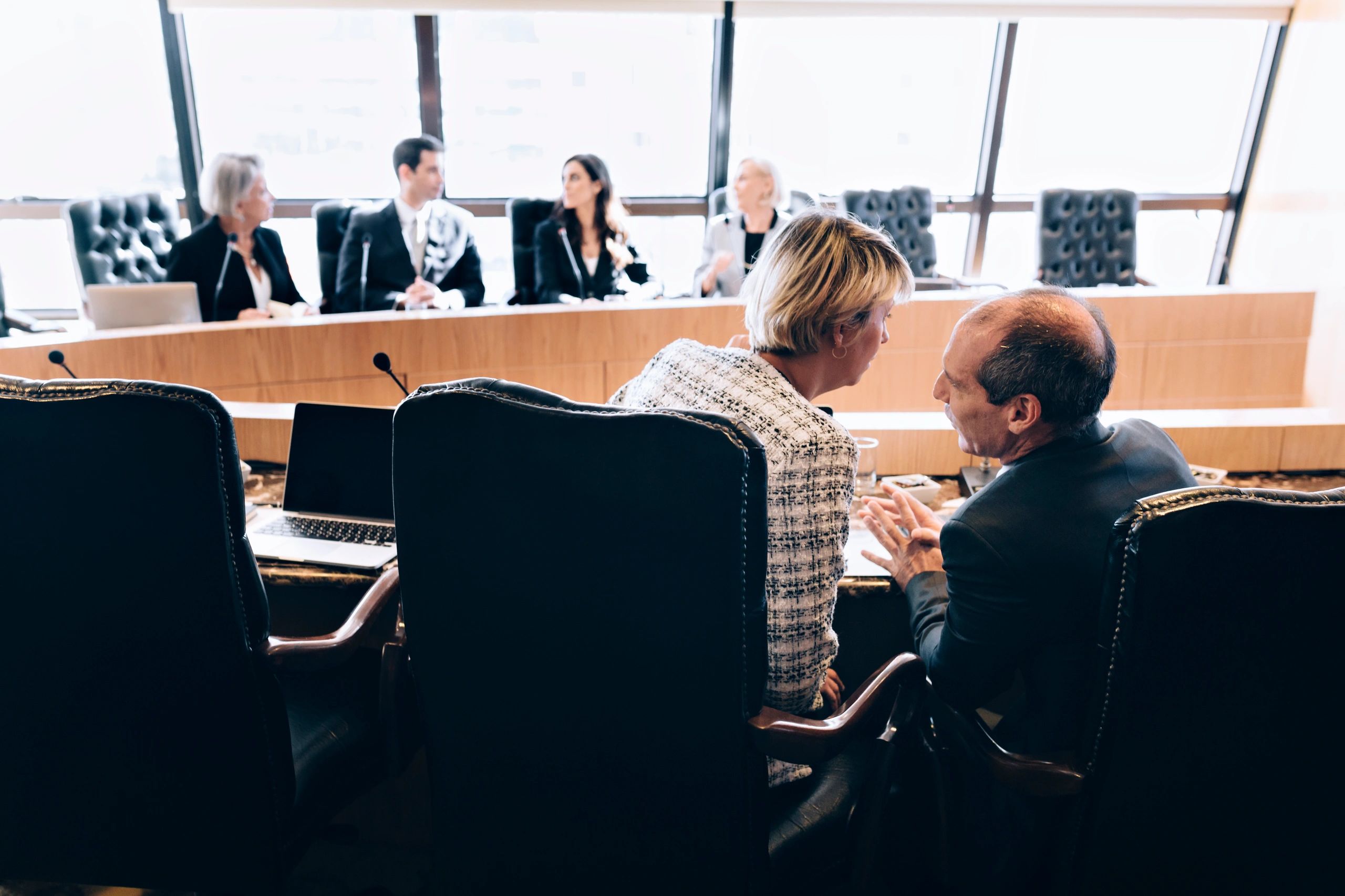 Team discussion in a boardroom setting